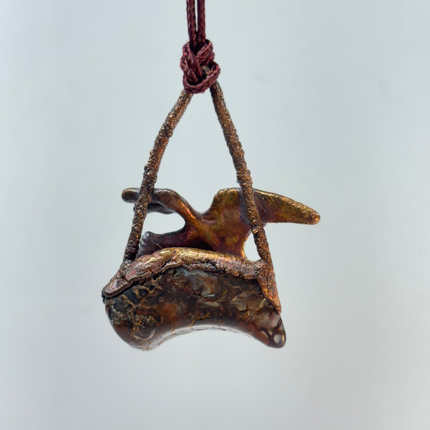 Dino on Dino! Petrified Dinosaur Bone Pendant with Pteradactyl