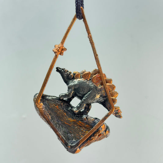 Dino on Dino! Petrified Dinosaur Bone Pendant with Stegasaurus