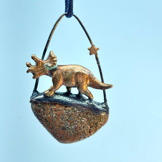 Dino on Dino! Petrified Dinosaur Bone Pendant with Triceratops