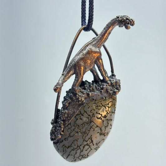 Dino on Dino! Petrified Dinosaur Bone Pendant with Sauropod