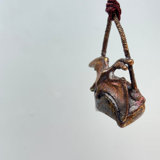 Dino on Dino! Petrified Dinosaur Bone Pendant with Pteradactyl